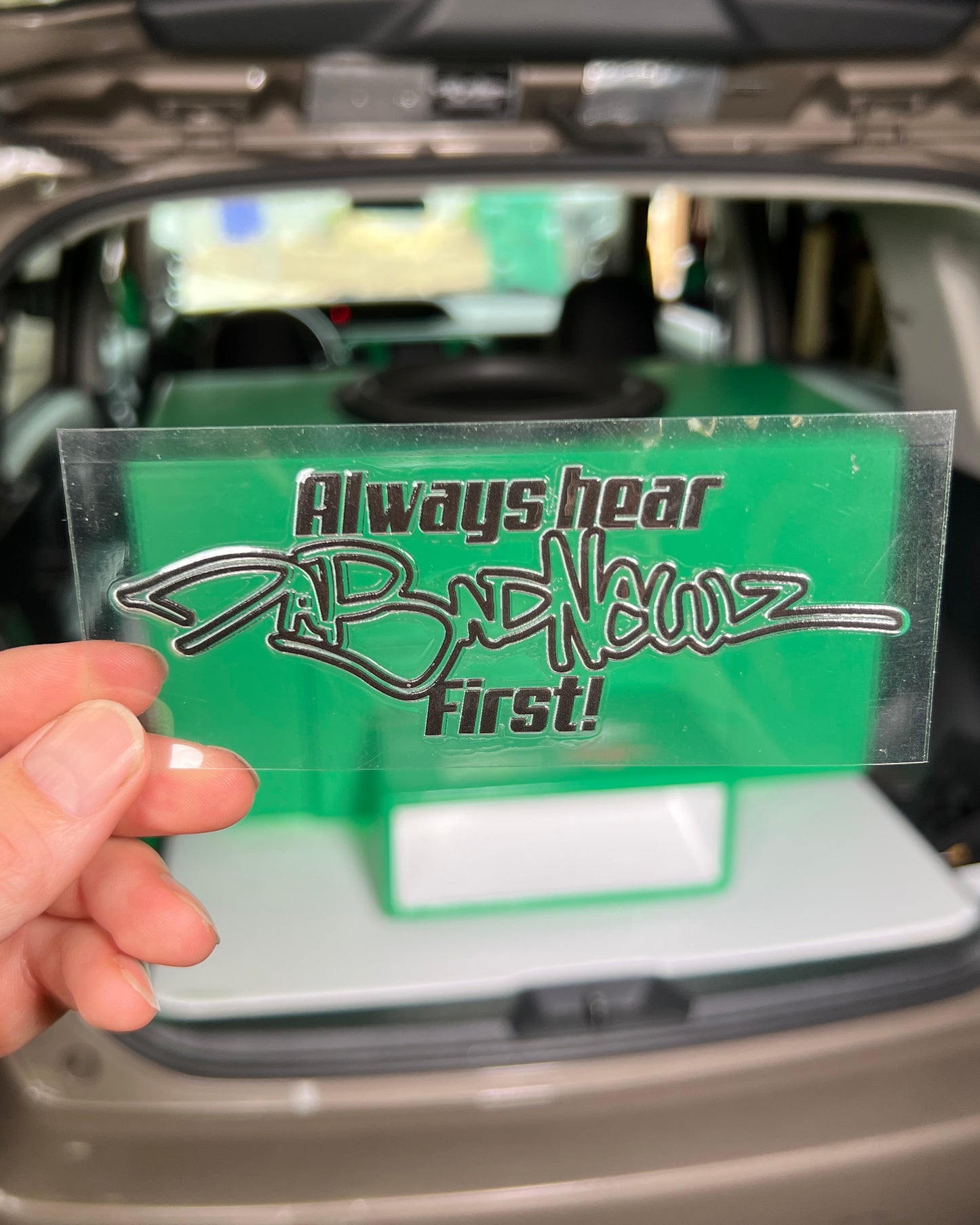 Black sticker with 'Always hear DaBadNewz first!" logo and text
