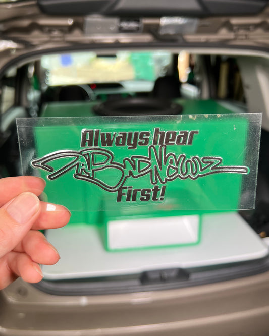 Black sticker with 'Always hear DaBadNewz first!" logo and text
